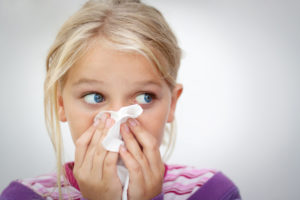 Girl suffering from poor indoor air quality