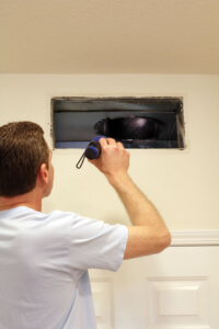 air duct cleaning technician